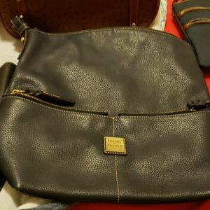 Dooney and Burke purses all five for sale at once